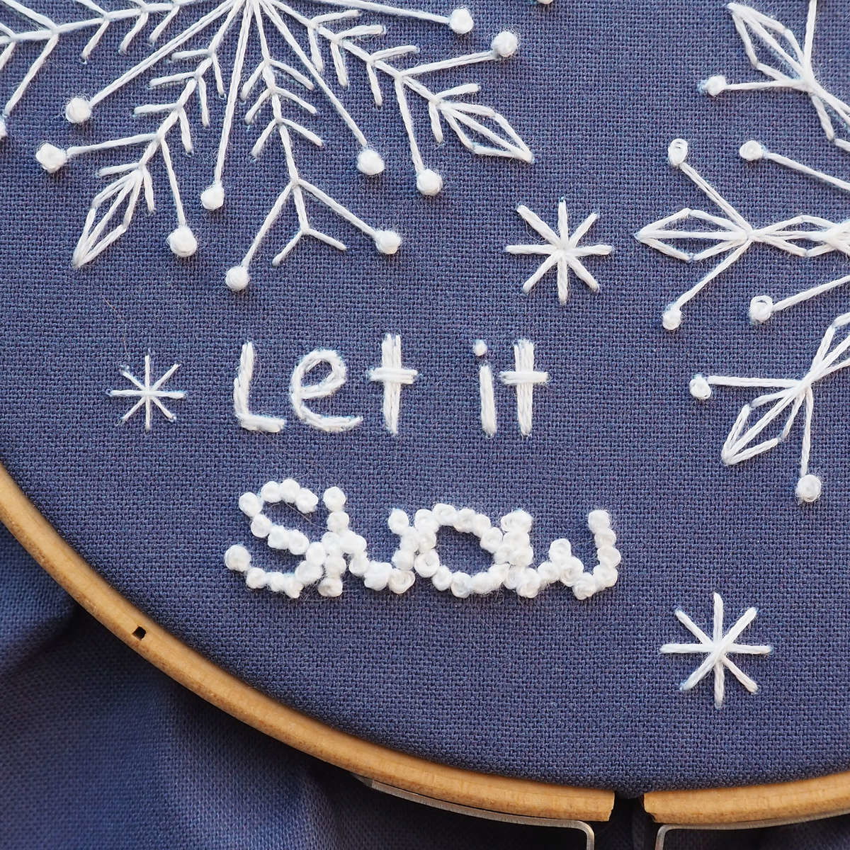 Let it snow in french knots to look like snowballs