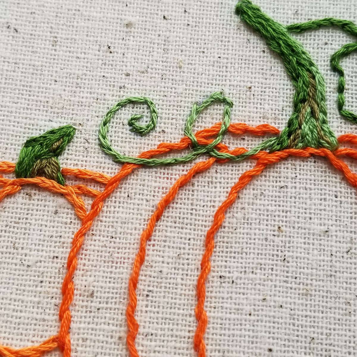 Embroidered pumpkin vines