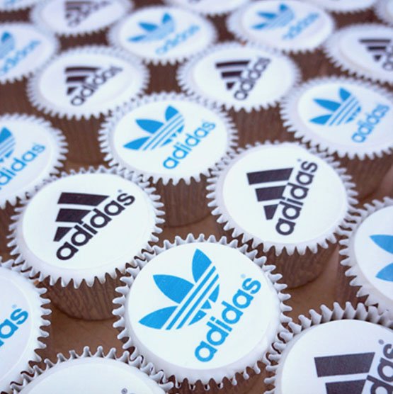 Corporate cupcakes with logo toppers 