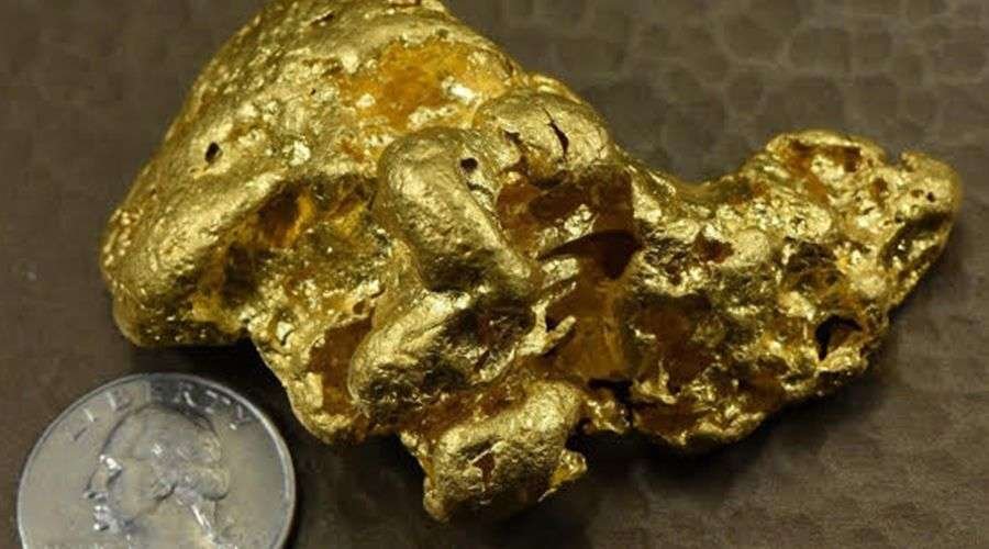 gold nugget with coin