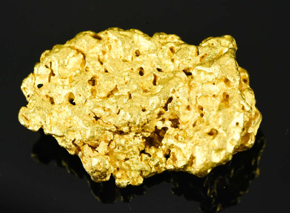 gold nugget with coin