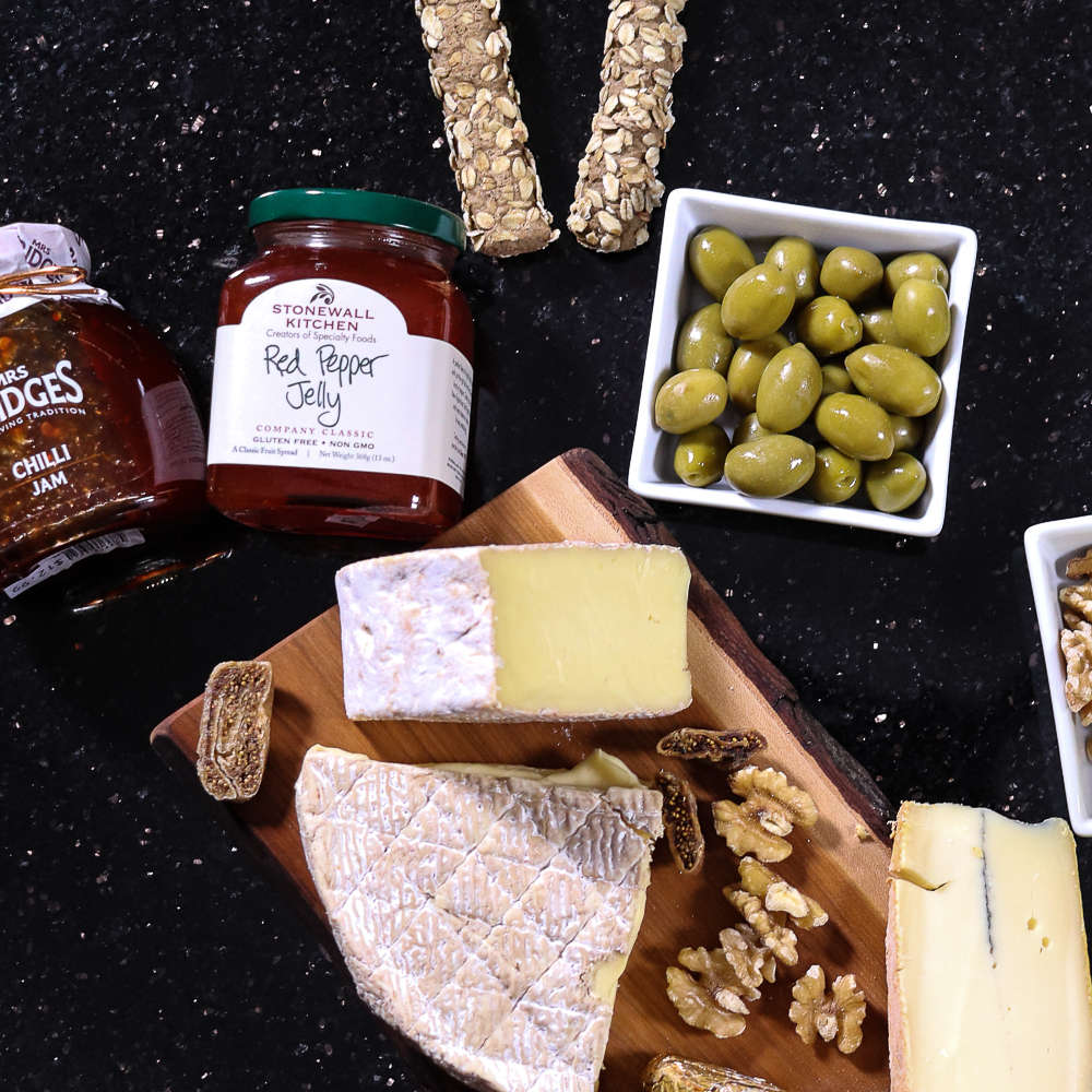 The Cheese of the Month Club get 3 exciting new cheeses each month!