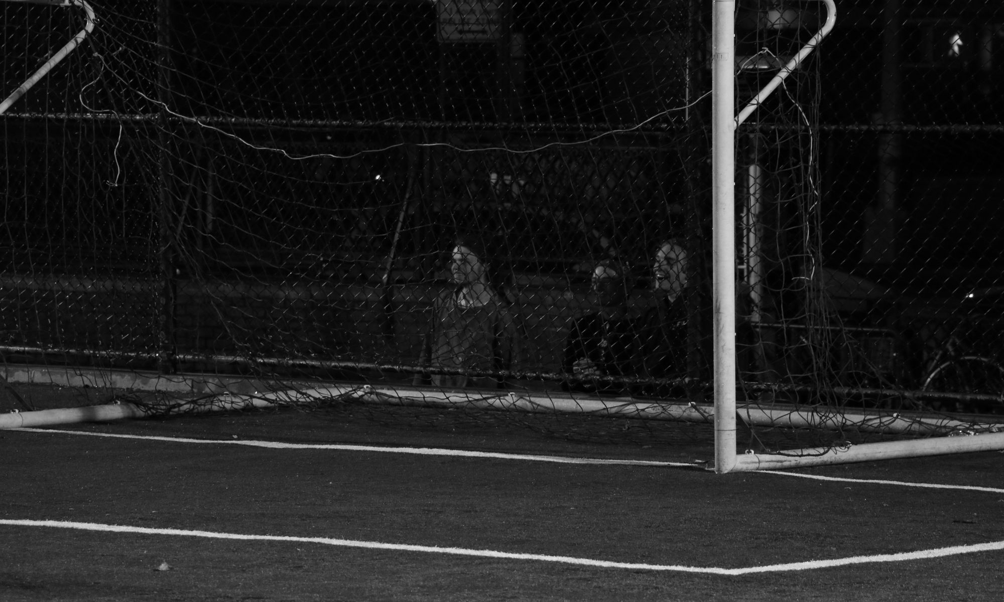 Eager onlookers watching football in NYC