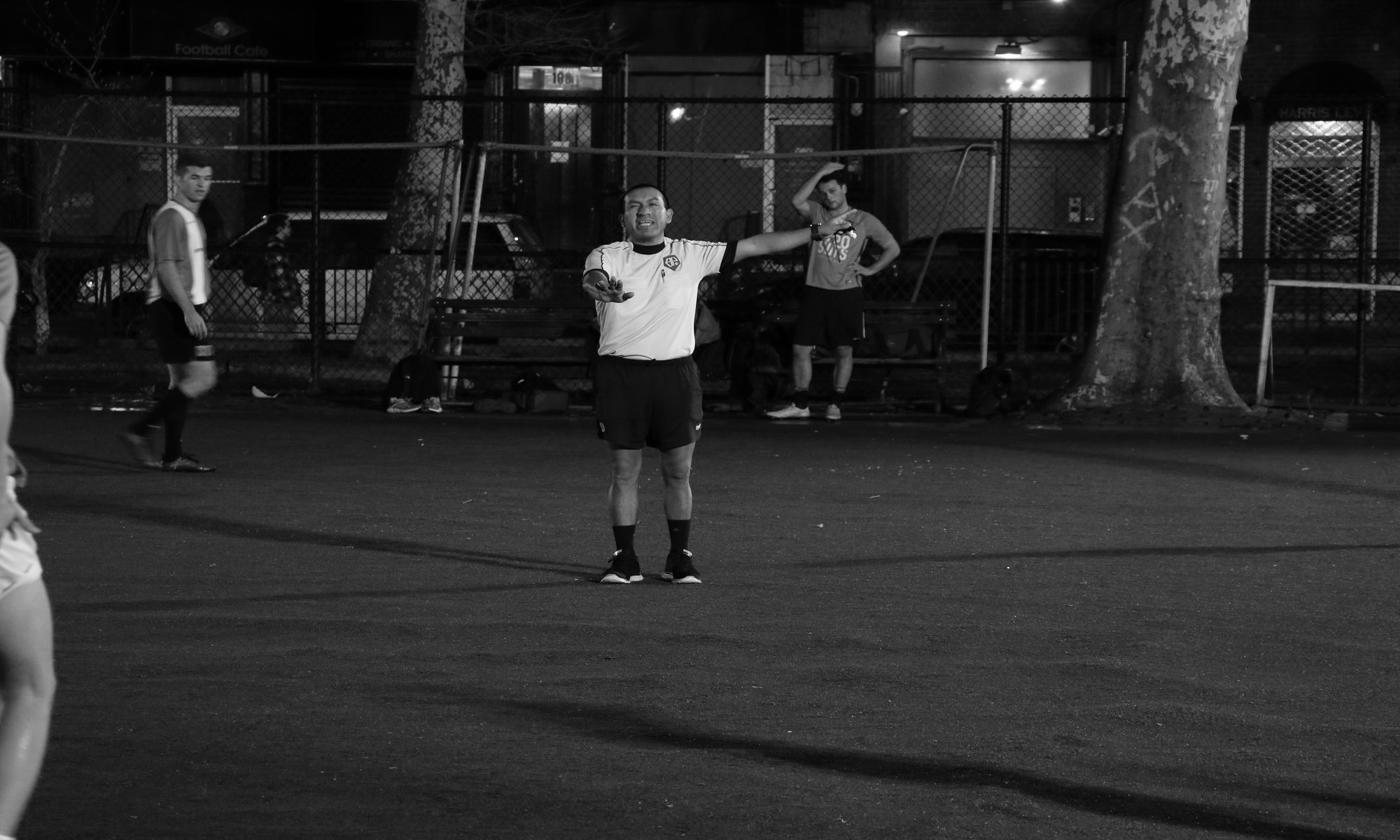 Ref kicks off a pickup game at Lion's Gate in NYC