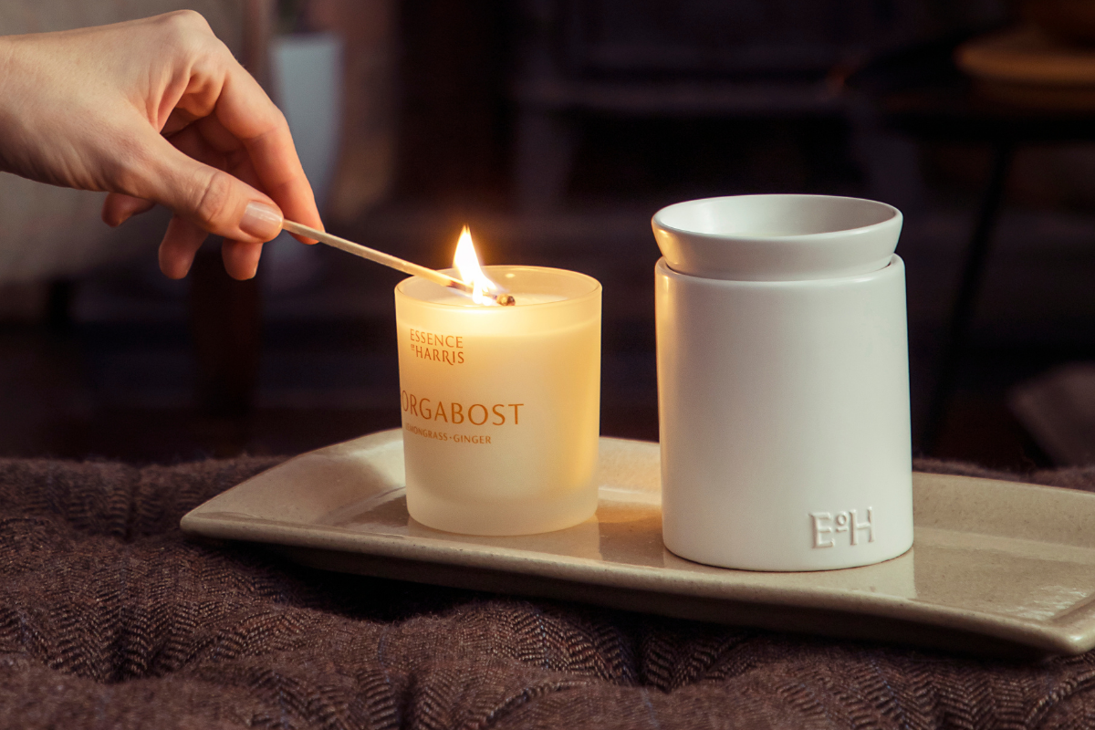 Candle burning on a heat-proof marble tray