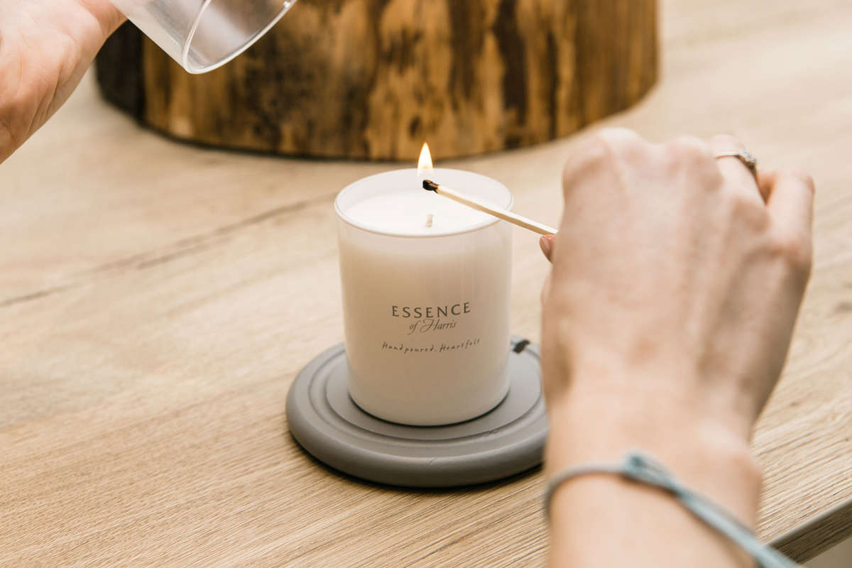 Candle burning on a heat-proof marble tray Candle burning on a heat-proof marble tray