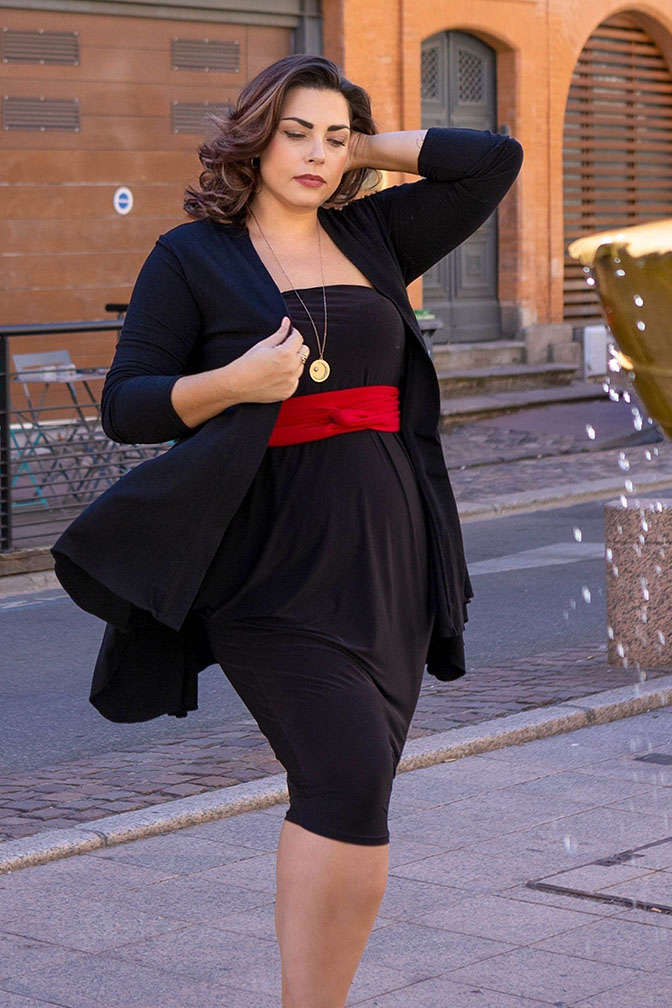 Tegan wearing a Diane Kroe Origami, Layer Jacket, and Sash Belt, standing in Toulouse