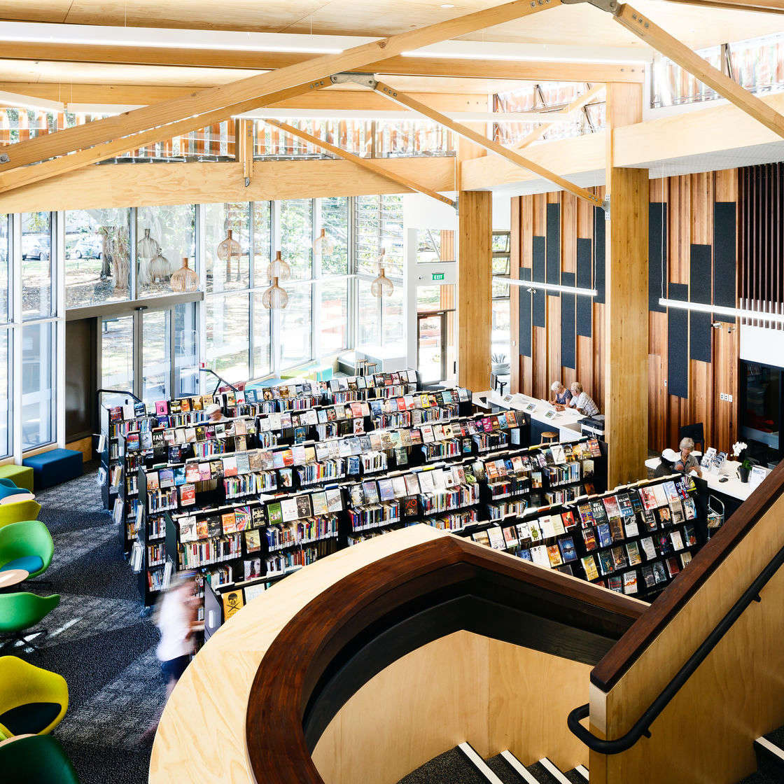 View of ground floor of library from middle landing on stair case