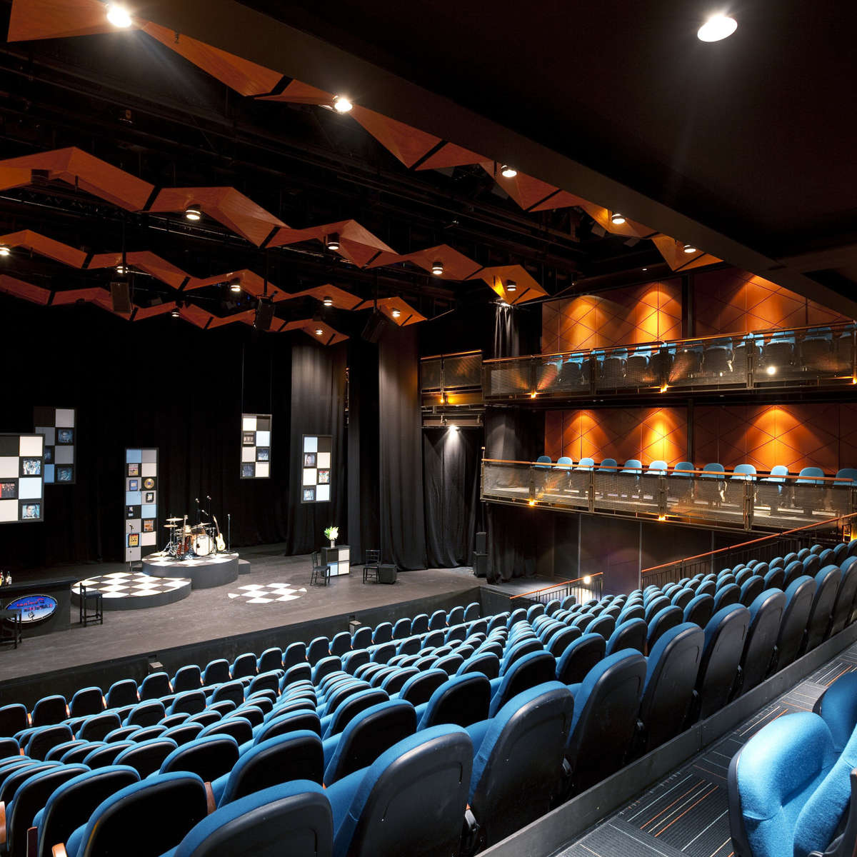 View of theatre stage from audience seating area