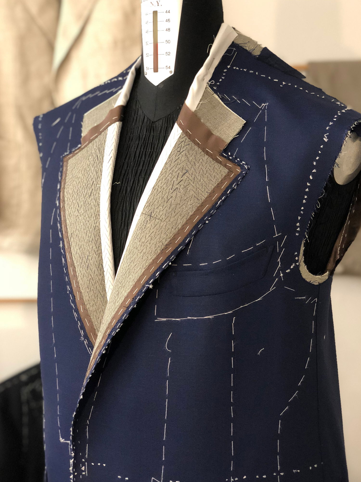 Sartoria Sciarra, bespoke suit, bespoke jacket in progress, hand made tailoring, bespoke tailoring, artisan craftsmanship, hand pad stitched lapels, Italian camel hair canvas, Loro Piana Zelander high twist wool fabric, luxury bespoke, luxury tailoring, barchetta out breast pocket, 