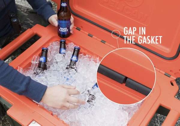 A person pulls a beer out of a cooler. An inset image shows the gap in the gasket of the cooler, which is there by design.