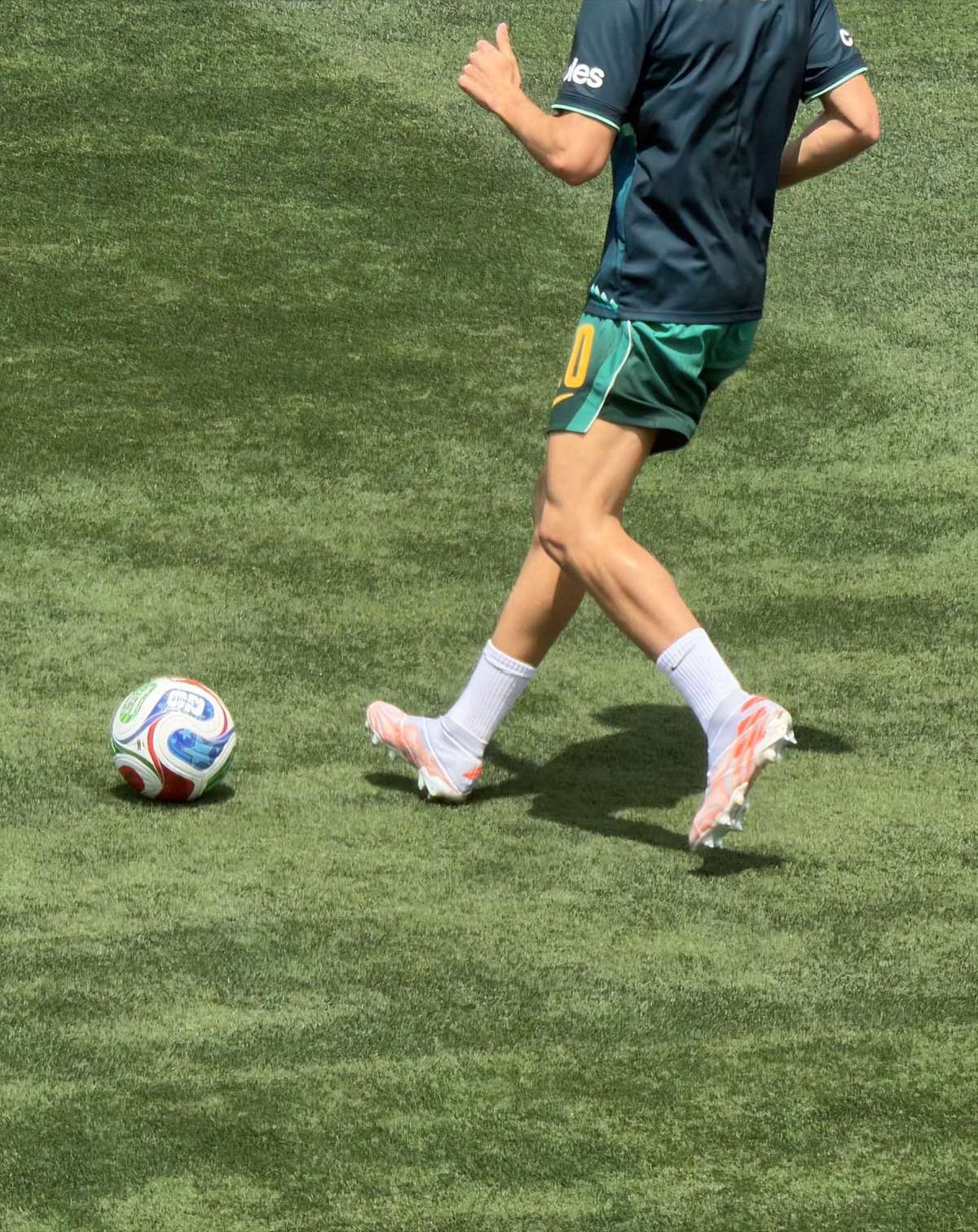 FIFA soccer friendly of man and ball on field
