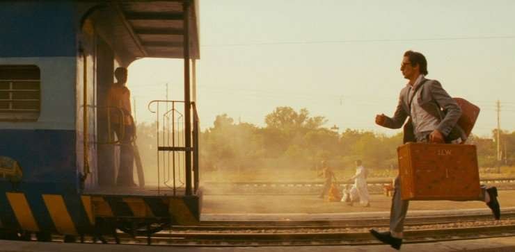 Example of a Tracking Shot capturing man running to catch his train