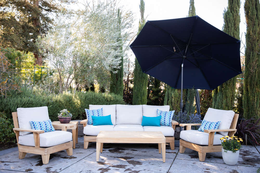 Teak set staged with umbrella