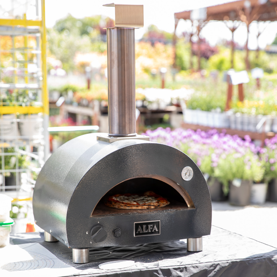 Pizza oven firing a pizza Pizza oven firing a pizza