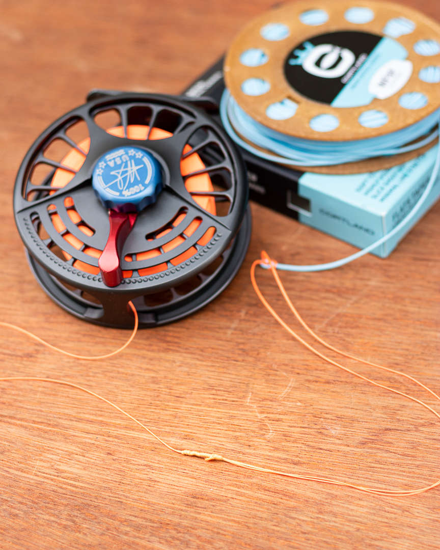 Fly fishing reels backing connected to fly line. Fly fishing reels backing connected to fly line.