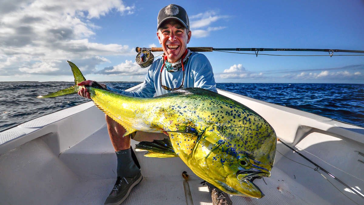 Lake Taylor with a Massive Mahi when fishing off the coast of the seychelles 