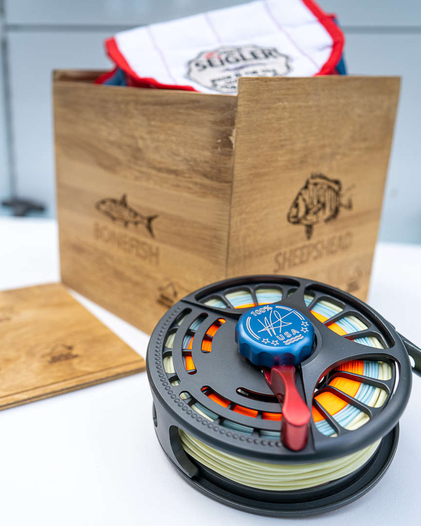 Seigler fly reel on boat with box. Seigler fly reel on boat with box.