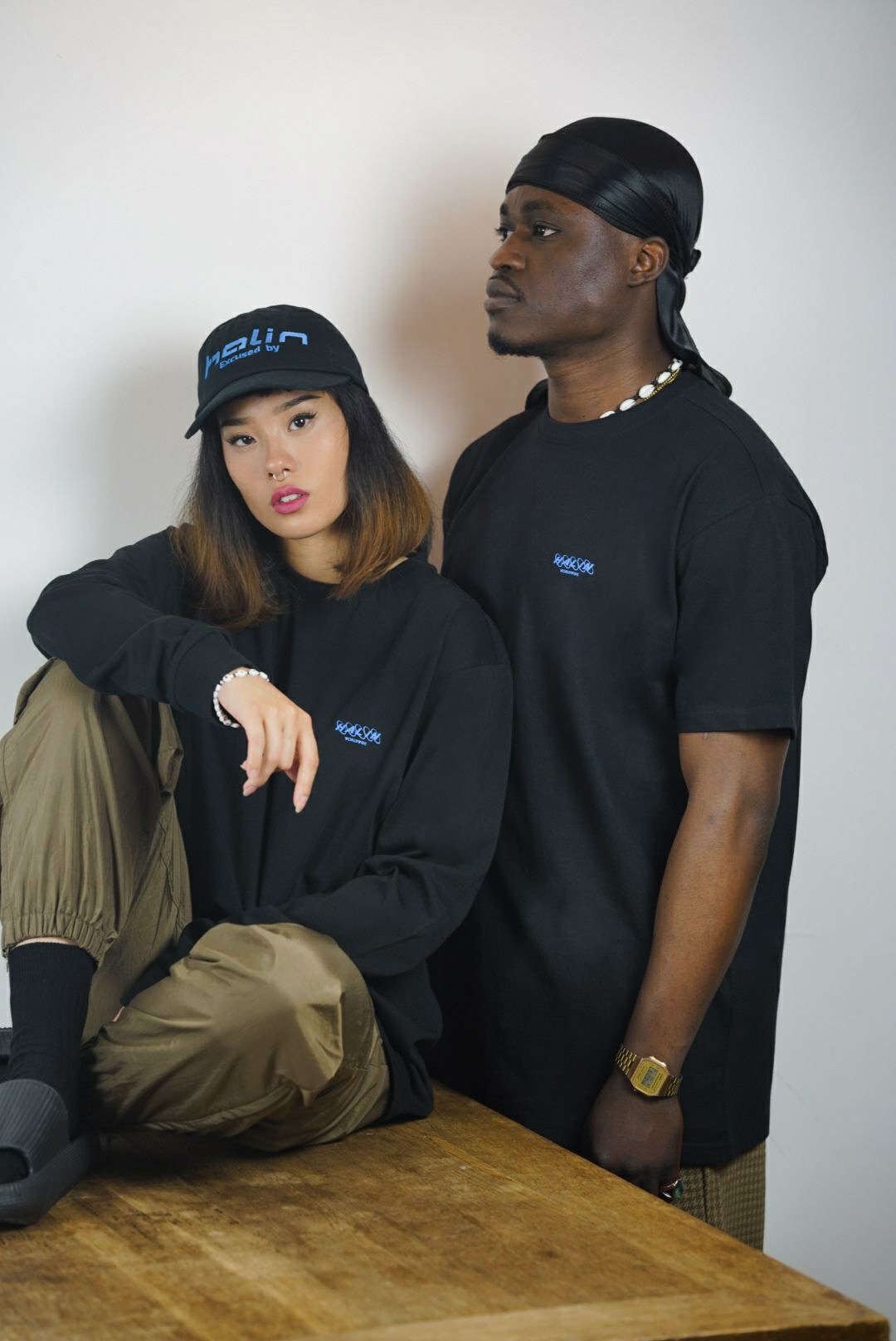 Female and male model wearing Halin Worldwide streetwear look part two from the Not Today collection. Female and male model wearing Halin Worldwide streetwear look part two from the Not Today collection.