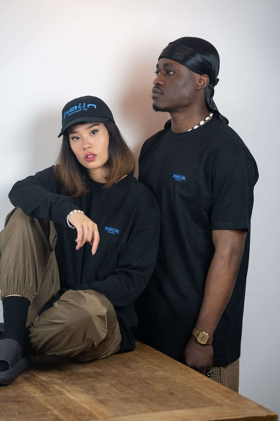 Female and male model wearing Halin Worldwide streetwear look part two from the Not Today collection.