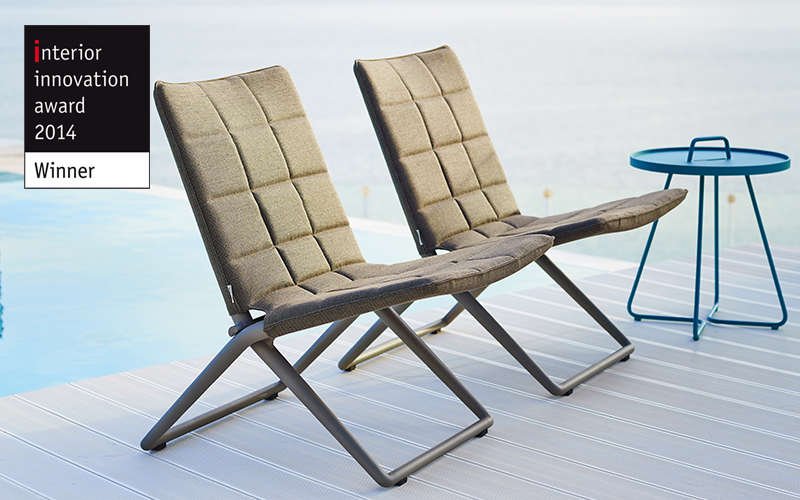 Grey folding  lounge chairs with blue side table