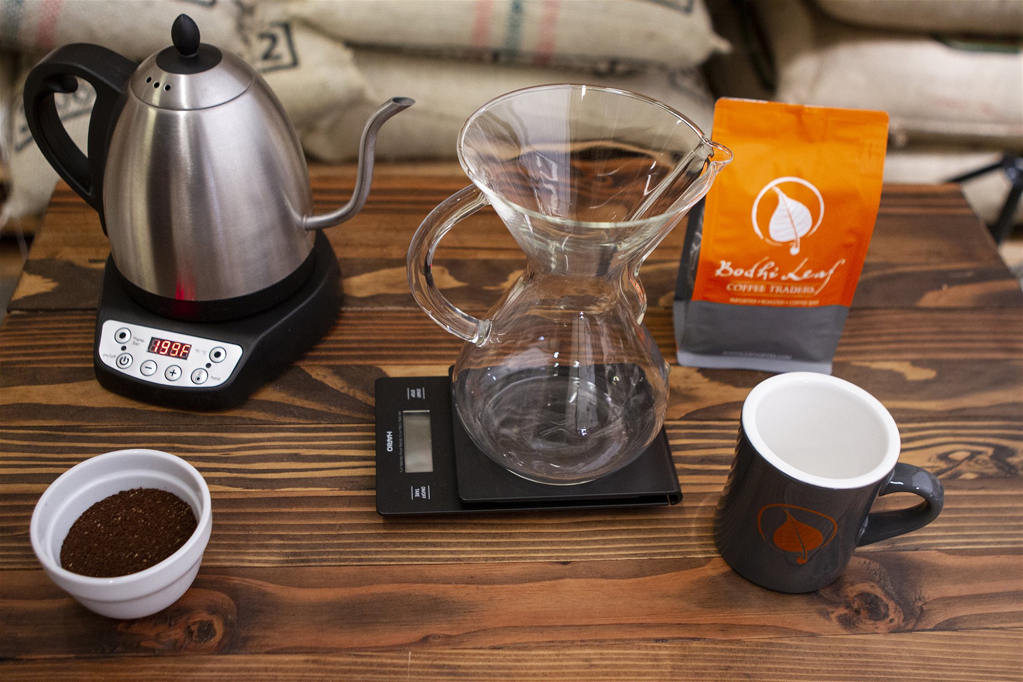 CHEMEX ON SCALE WITH MUG, KETTLE, AND COFFEE