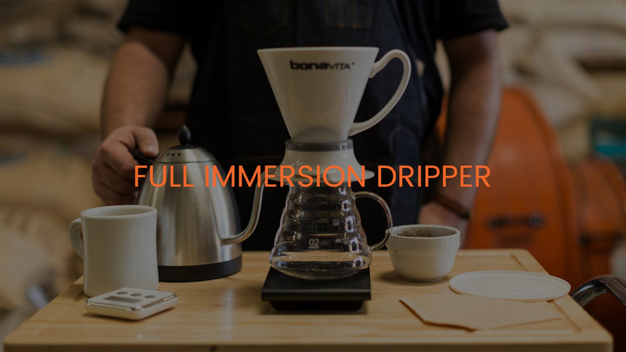 Full immersion dripper on scale with mug and kettle. Titled "Full Immersion Dripper"