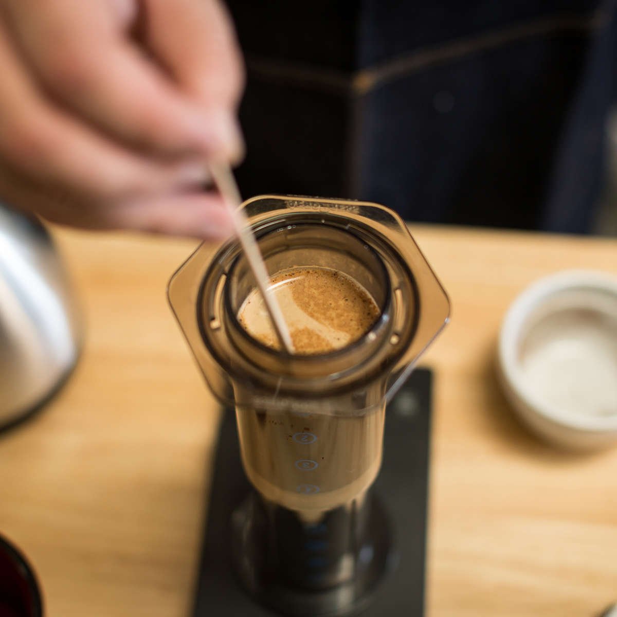 Stirring coffee in Aeropress