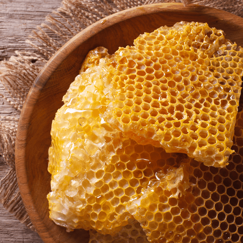Cera alba ("beeswax") is a purified wax derived from bee honeycom...