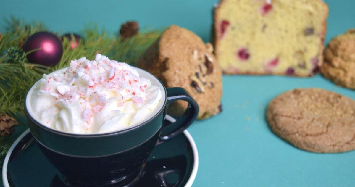 Holiday Mint Mocha next to cookies and bakery.