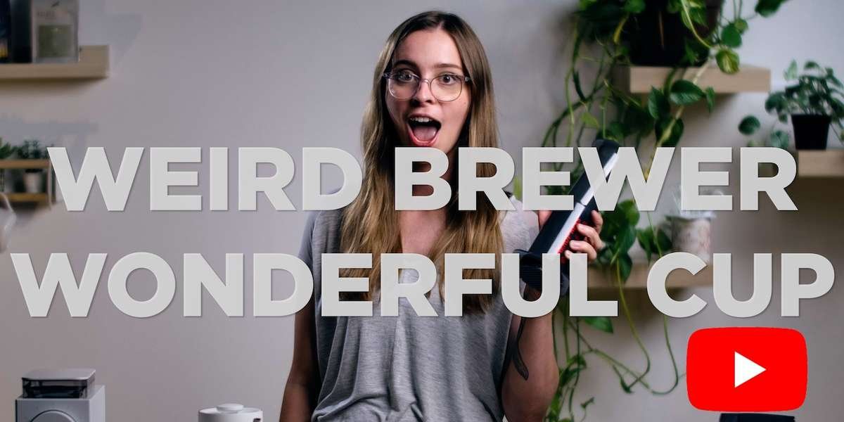 Maud holding an Aeropress - Goes to our Youtube Aeropress Video