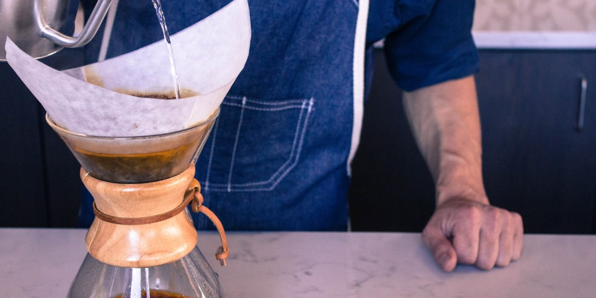 Brewing coffee on a Chemex coffee maker