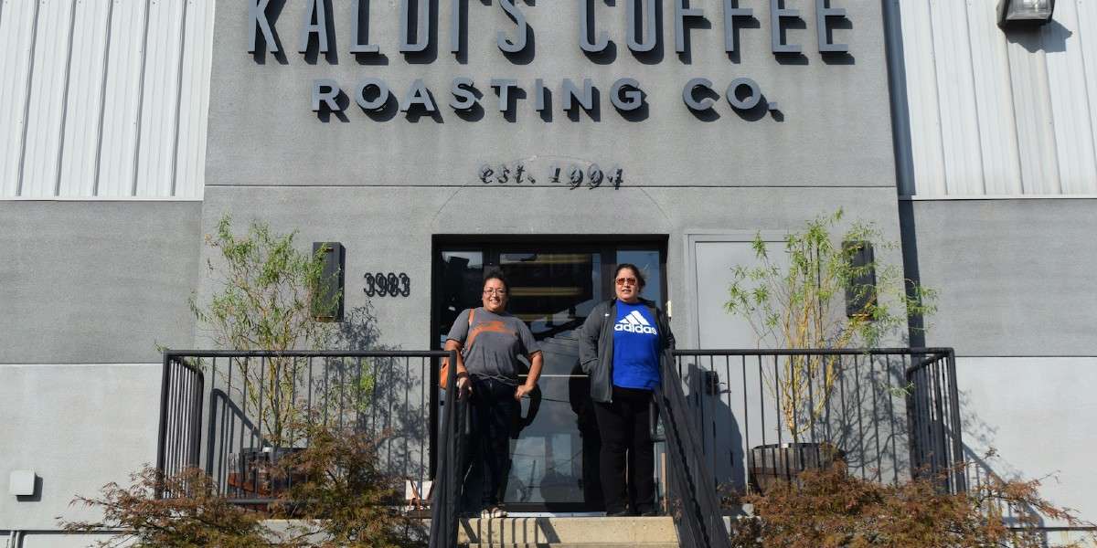 Lupe and Maria standing outside the Kaldi's Coffee Roastery in St. Louis, MO