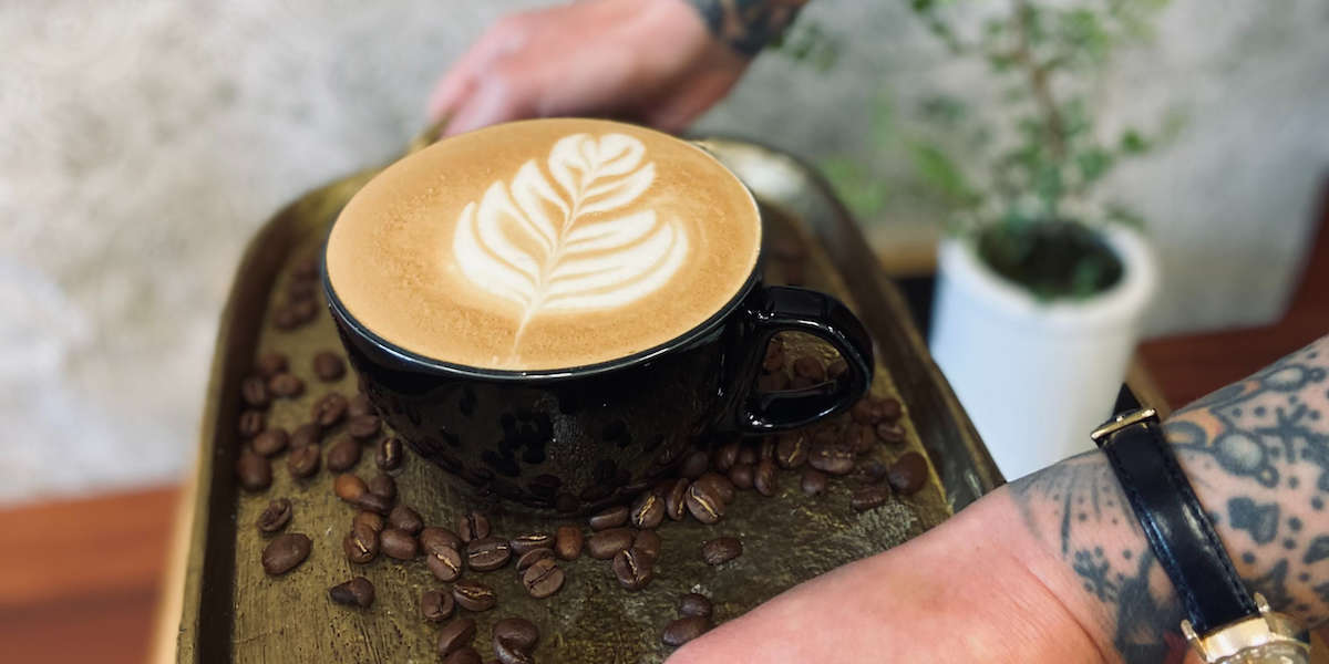 Vanilla Latte on a gold tray