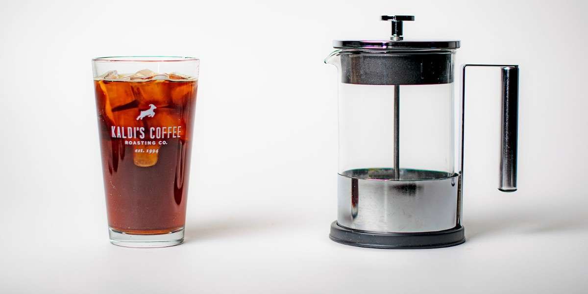 French Press next to a glass of iced coffee