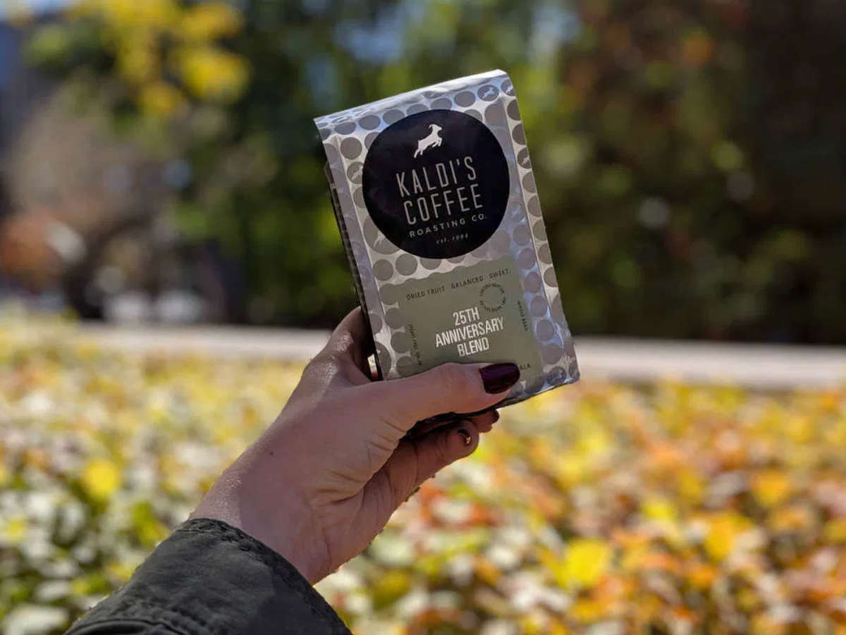 Kaldi's Coffee 25th Anniversary blend is held by a bodiless hand