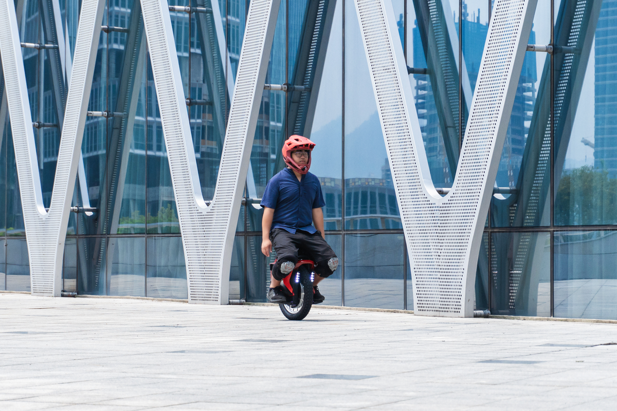 Person Riding King Song S22 Eagle Electric Unicycle in the City