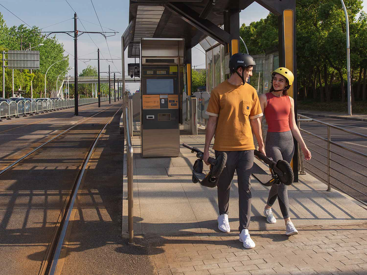 People Using the Segway Ninebot KickScooter E45 Fold and Carry feature