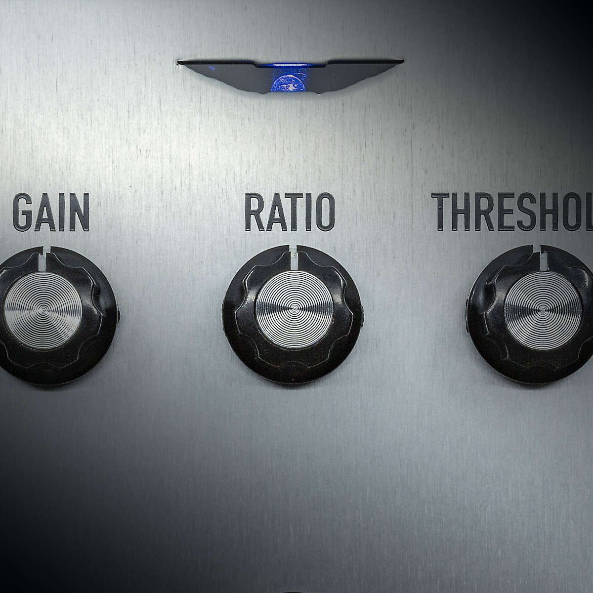 Close up of the gain ratio and threshold controls on the Ashdown studio compressor pedal