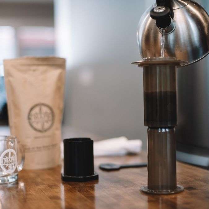 Pour water into Aeropress