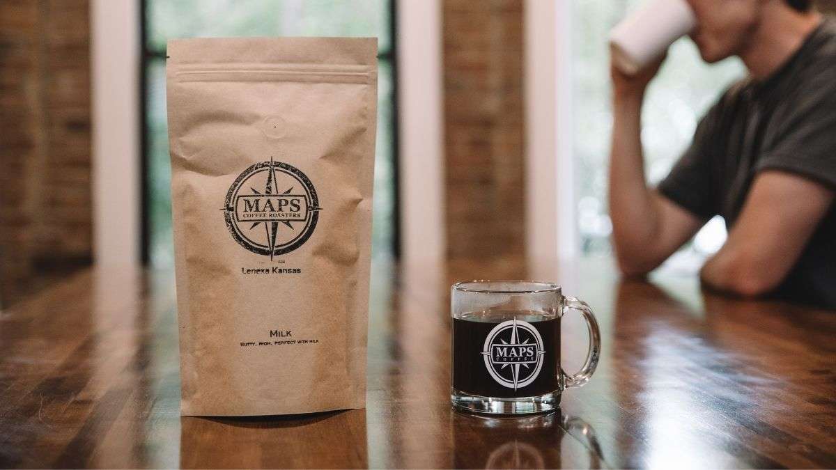 Man drinking a cup of fresh coffee