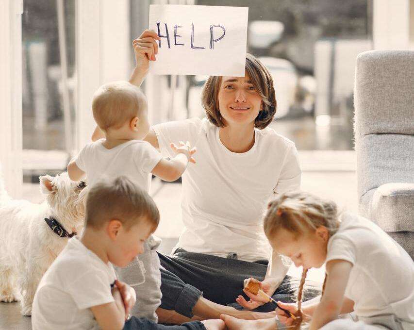 Mother with Children needing help to manage them
