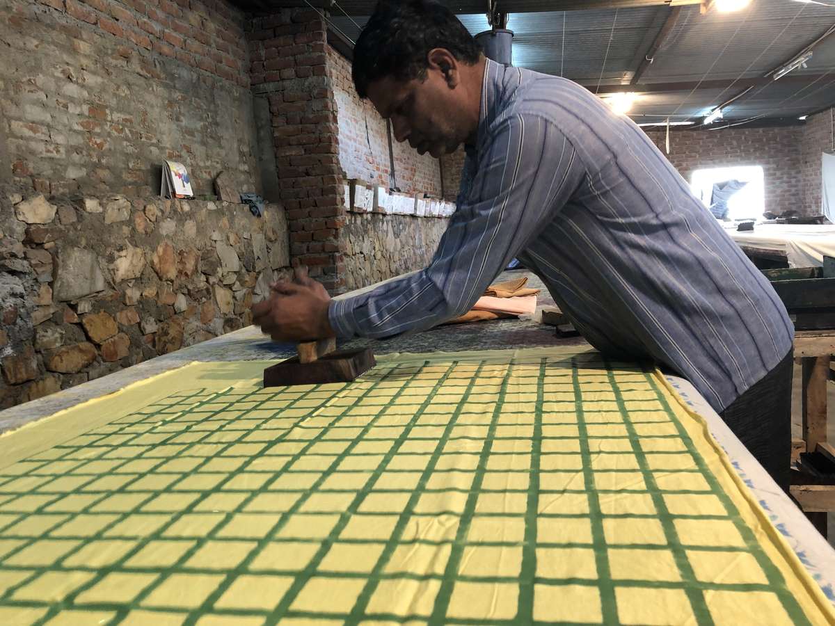 Artisan in Jaipur blockprinting maggie jayne organic cotton 