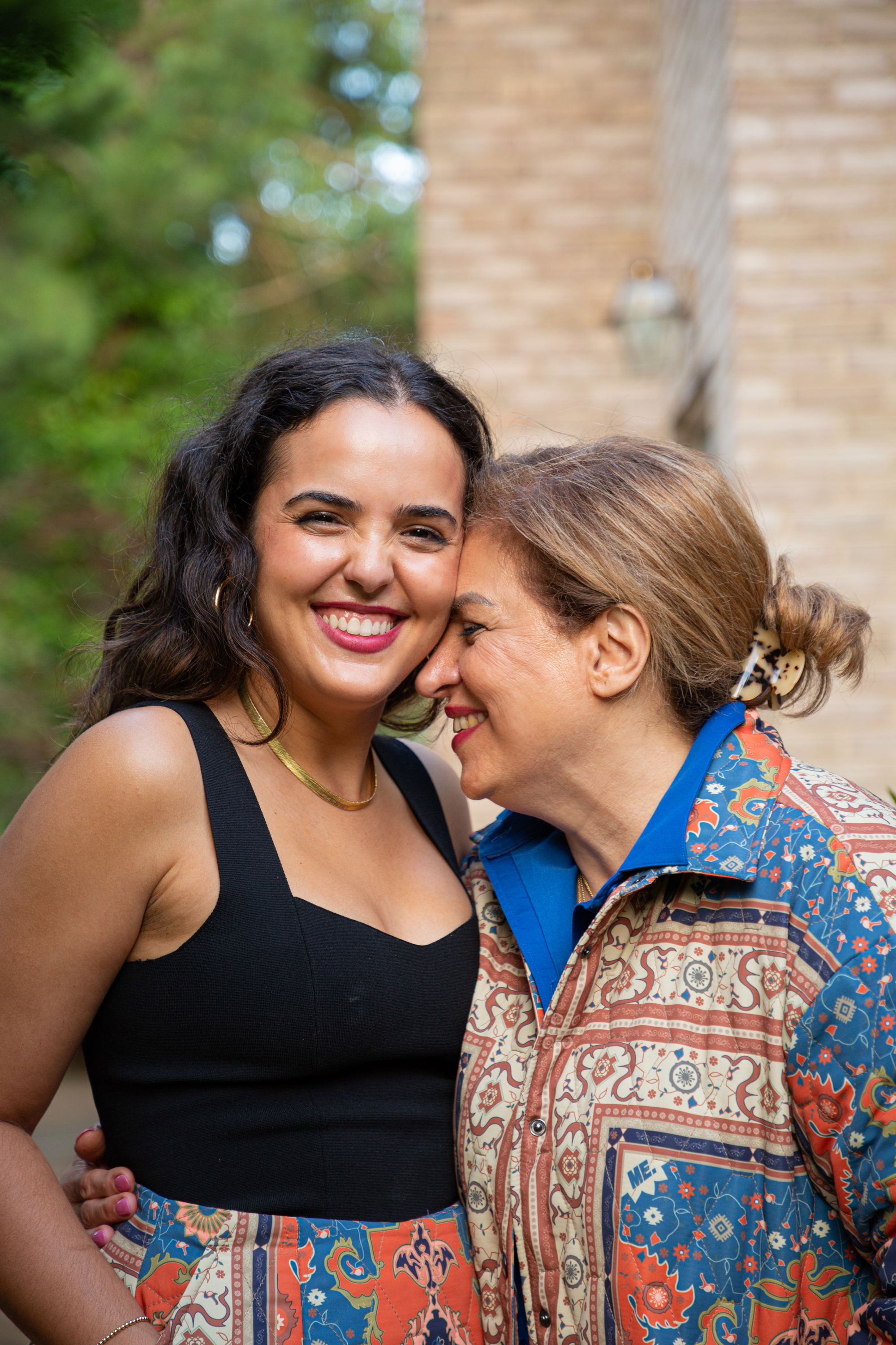 Authors and mother-daughter team Roya and Gita posing together